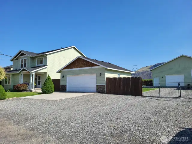 View SW to Garage and House from Driveway