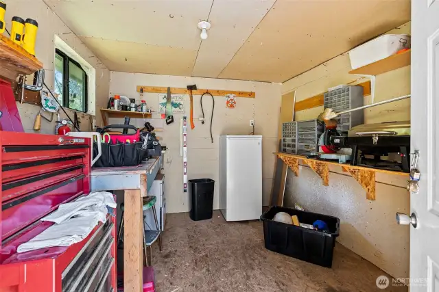 Extra storage space in the outdoor shed—perfect for tools, gear, or even your next hobby project.