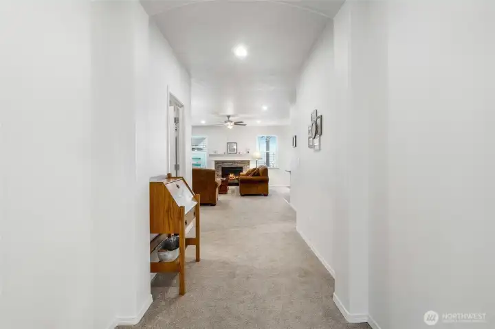 Continuing down the hallway, you head straight to the living room.