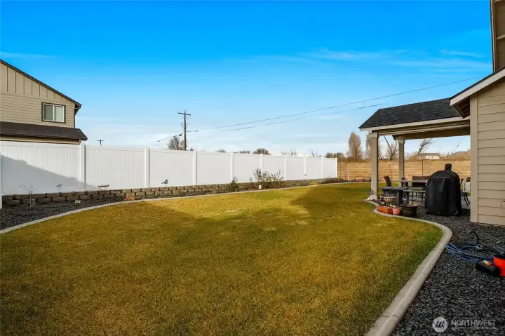 The backyard reminds me of a graduation party I went to not long ago.  It's so nice for yourself and guests when you have a covered and lit-up area to have your morning coffee.