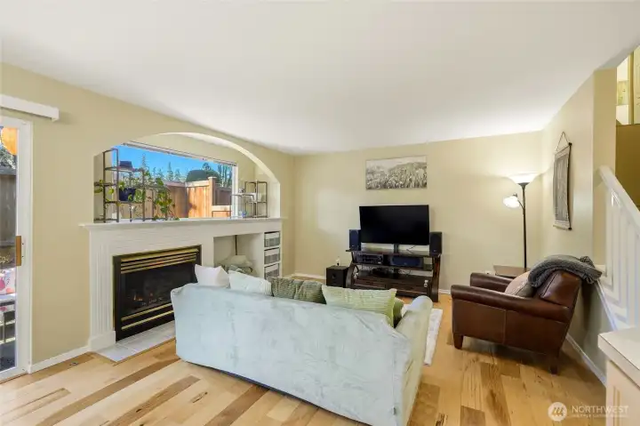 Living room with fireplace and built-ins.