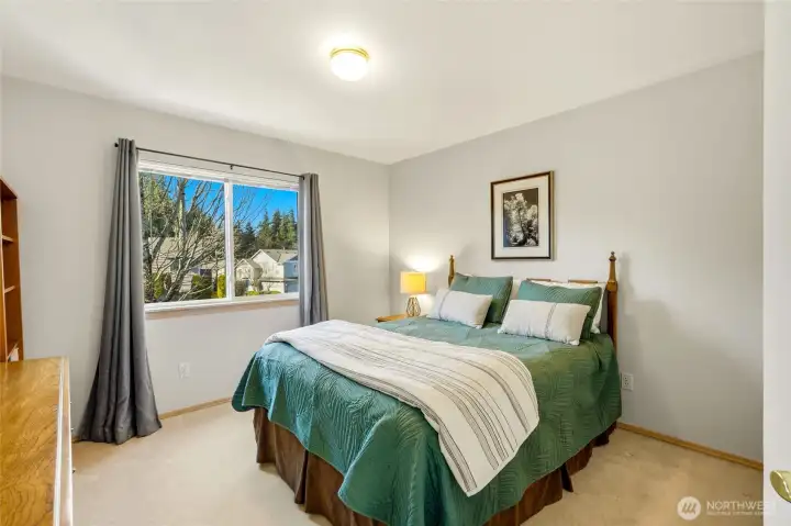 Bright secondary bedroom.