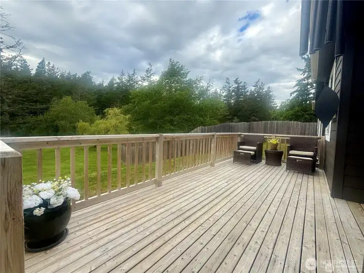 Inviting and spacious entry deck and porch.