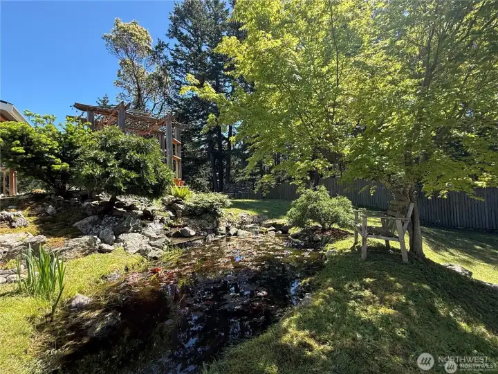 The sound of the water adds a calming ambiance to the outdoor setting.