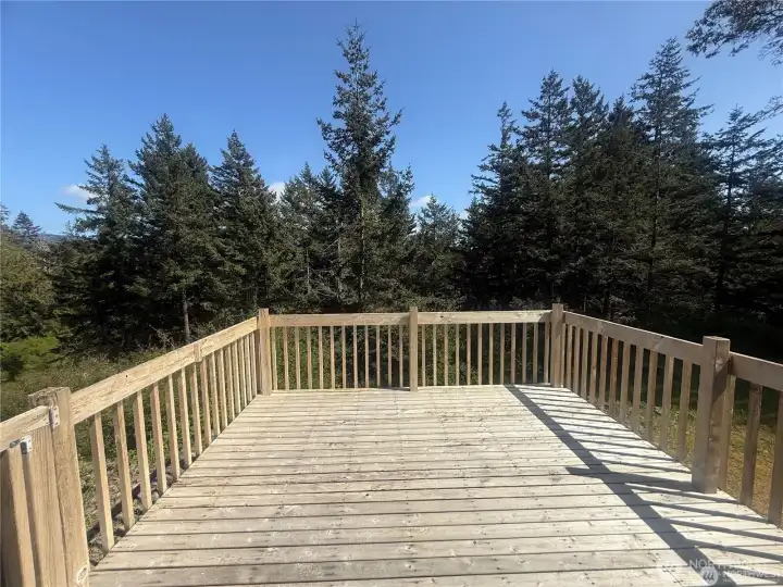 Completely private entertaining deck off the back of the home.