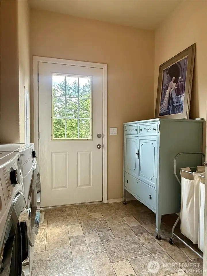 Laundry room with access to yet a third deck!