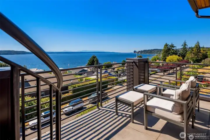 Step out of master bedroom to relax on the 2nd floor deck.