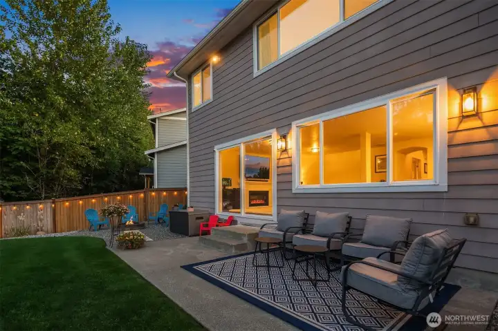 The living room steps out onto this spacious patio through the extra large sliding glass doors pictured here.