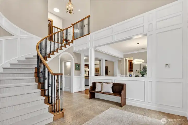 Sweeping stairway to upper Bonus Room, Sun Deck, and three Bedrooms