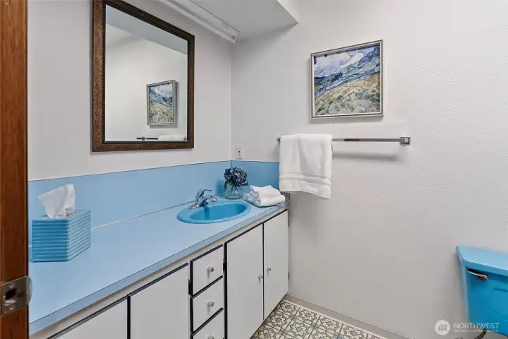 Beautifully blue basement bathroom