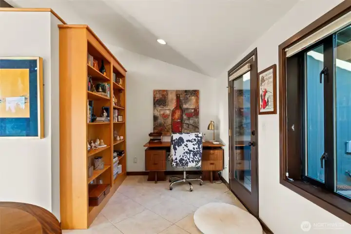 Space off the kitchen is perfect for a desk or study area.