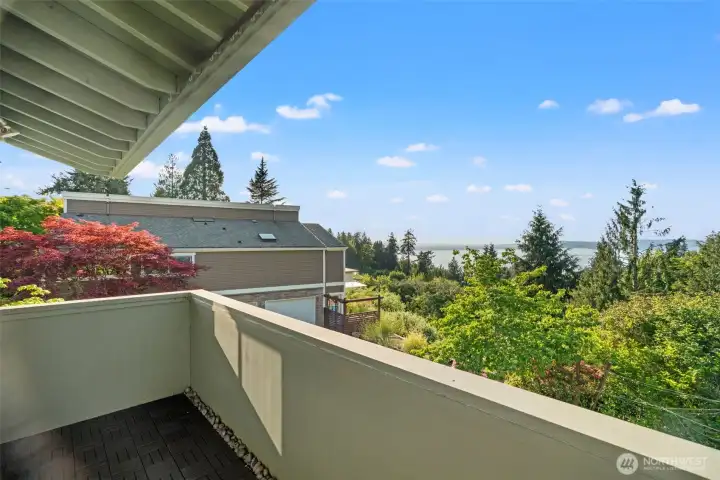 Private view deck off of the primary bedroom.