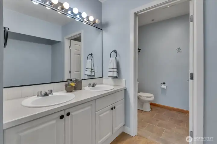 Primary ¾ en suite with double-sink vanity Primary ¾ en suite with double-sink vanity