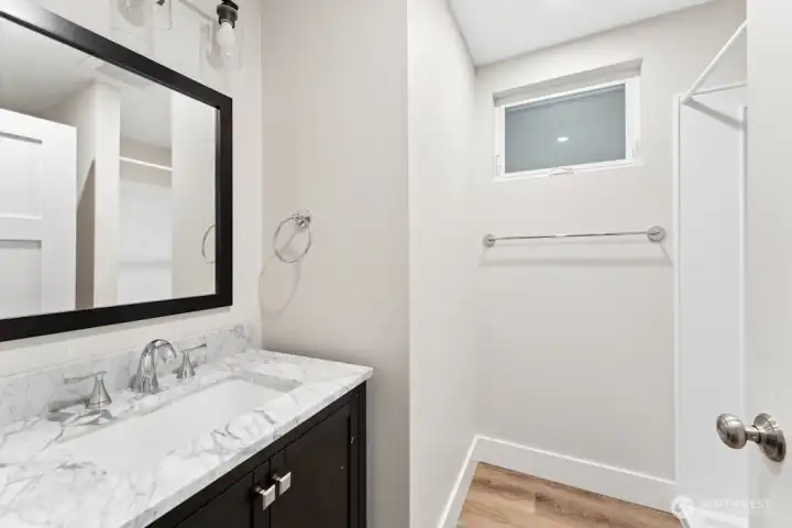 Unit B One of 2-3/4 baths on the 2nd level - both nearly identical and tastefully updated with modern finishes...