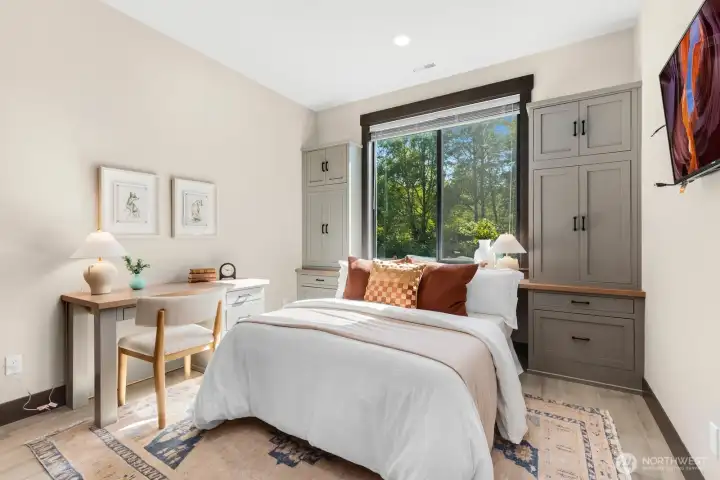 Custom built-ins make this bedroom extra special (could also be a second office) Custom built-ins make this bedroom extra special (could also be a second office)