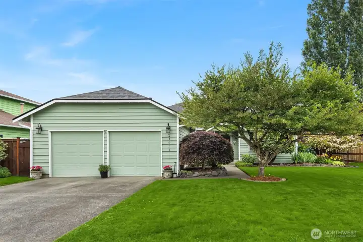 Plenty of parking in front of the 2-car garage. Also of note, the 50-year composition roof is new. Plenty of parking in front of the 2-car garage. Also of note, the 50-year composition roof is new.
