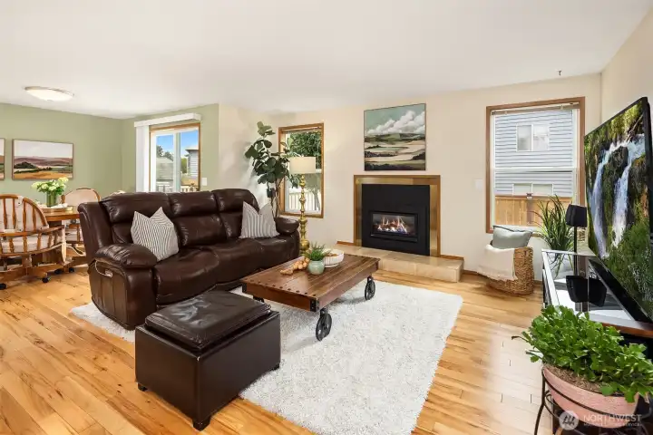 The great room features beautiful hickory hardwoods and a gas fireplace. The great room features beautiful hickory hardwoods and a gas fireplace.