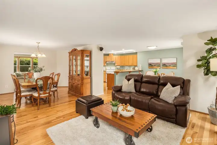Great room, with dining room, kitchen, and living room beyond. Great room, with dining room, kitchen, and living room beyond.