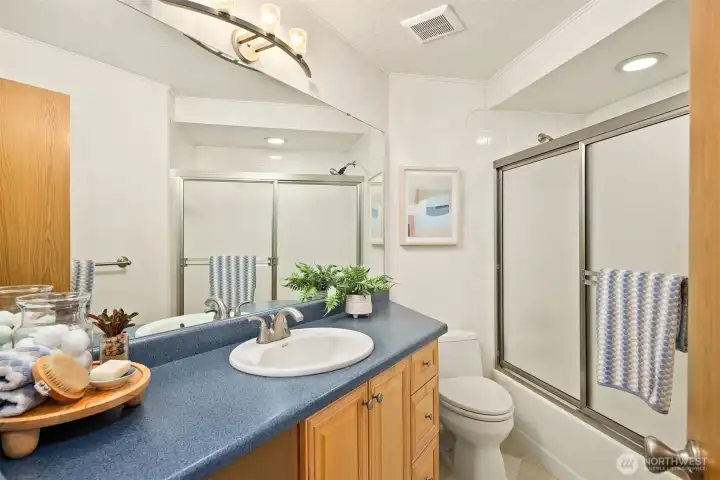 The three secondary bedrooms share this full hallway bath. The three secondary bedrooms share this full hallway bath.