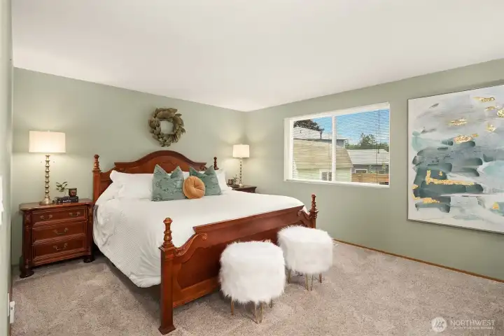 The primary overlooks the backyard and is plenty spacious for large furniture. The primary overlooks the backyard and is plenty spacious for large furniture.