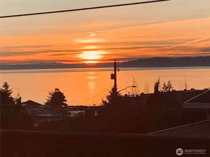 Witness breathtaking sunsets over Puget Sound as the sky transforms into a canvas of gold and crimson. The tranquil water reflects every hue, creating a serene backdrop framed by evergreens and distant mountain silhouettes. Each evening feels like a private showing of nature’s artistry—an inspiring reminder of the beauty that defines Northwest living. Witness breathtaking sunsets over Puget Sound as the sky transforms into a canvas of gold and crimson. The tranquil water reflects every hue, creating a serene backdrop framed by evergreens and distant mountain silhouettes. Each evening feels like a private showing of nature’s artistry—an inspiring reminder of the beauty that defines Northwest living.