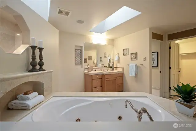 Upper primary suite bath. Jetted tub, large walk-in shower, double vanities and huge walk-in closet.