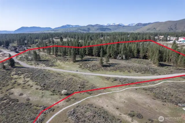 Flat areas and established treescreate green belt areas on this spectacular property.