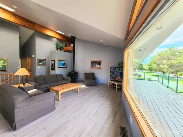 Upstairs living room with a wood fireplace.