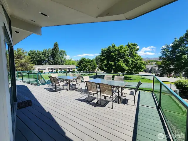 Expansive deck wrapping around the entire front of the house.