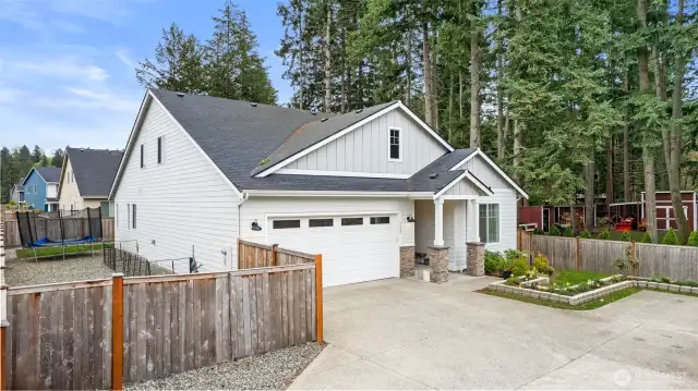 Tucked away, this home is the perfect blend of being in a neighborhood while maintaining some privacy.  The long driveway allows for tons of extra parking and the double RV gates give access to storing large items along the side of the house.