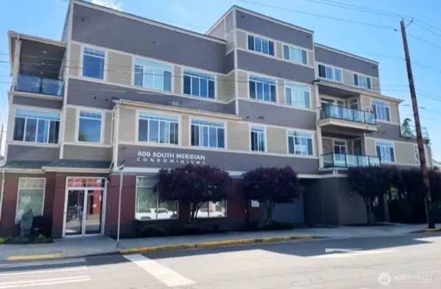 400 S. Meridian is synonymous with Class and Access. Class, that this address represents the 10 best condominiums in Downtown Puyallup. Class, that this address provides you the comfort, security, convenience and peace-of-mind that downtown upscale living should provide. Access, that this address literally provides convenient access to anything that IS Puyallup. The Farmer's Market, the Library, Anthem, Elements, a host of restaurants, City Hall and the Washington State Fair!  Plus, easy access to enjoy the Daffodil Parade, Santa Parade and Meeker Days from your own private deck!
