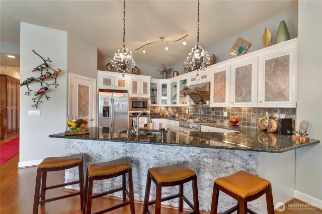 Peninsula Island seats 4 comfortably, great room facing sink means you're always part of the action!