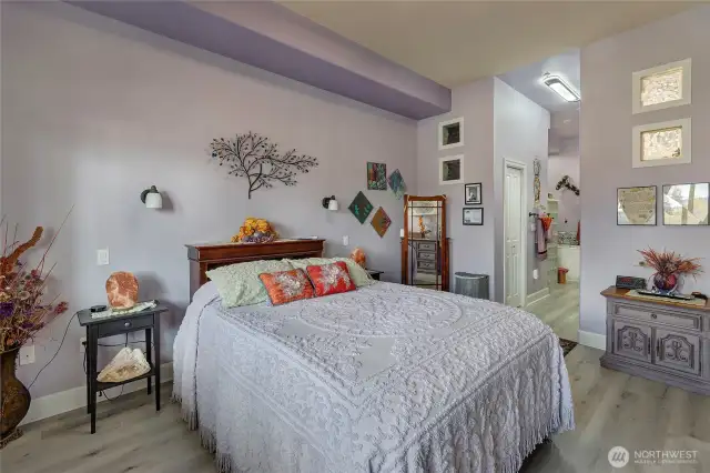 Recent refresh of Primary Bedroom means new engineered hardwood flooring and fresh paint which extends into the spa-like bath area. New 12" x 12" Square Imported Glass Blocks provide even more ambient lighting!