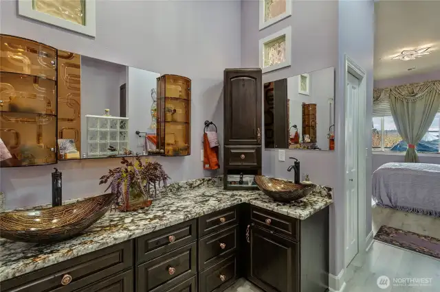 Updated Primary Bath has double vanity on marble countertops. All new sold wood cabinets, new comfort height toilet and jetted tub.