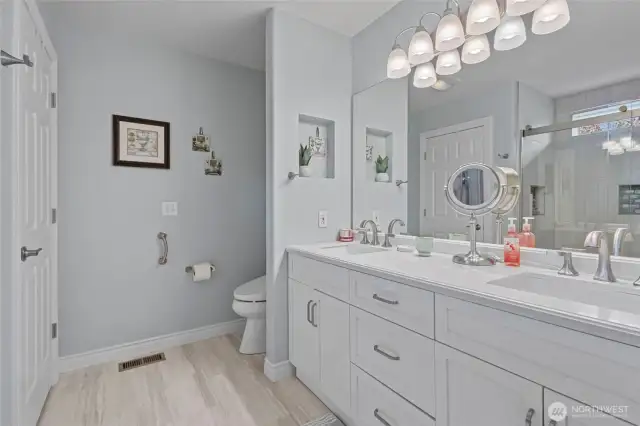 Updated flooring, vanity and countertops.