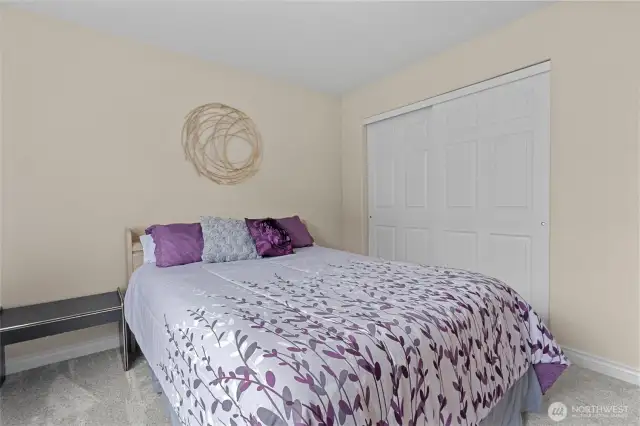 Second bedroom, even the closet doors have been painted!