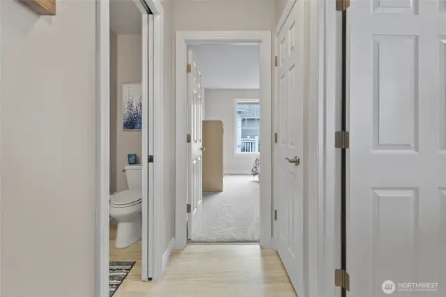 3/4 bath located to the left of this hallway