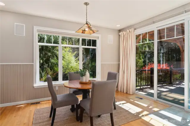 Dining area with slider to expansive deck