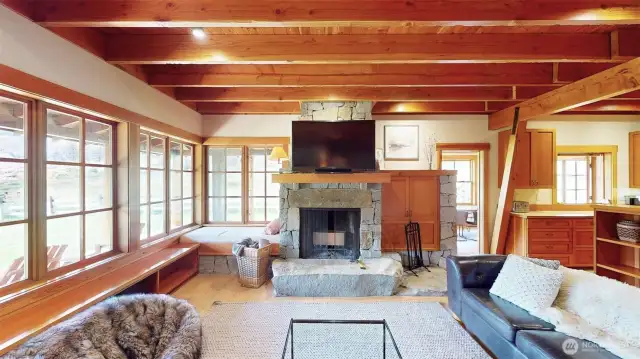 Main house living room with stone fireplace