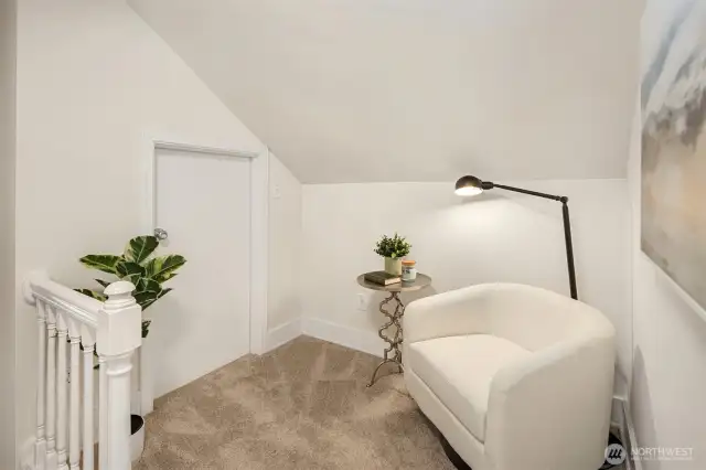 Upper level landing with large storage closet