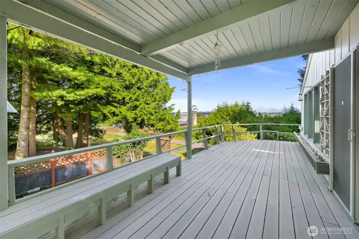 Partially covered deck. What a great place to enjoy morning coffee or evening beverages.