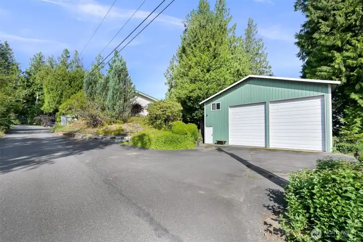 Check out this amazing shop/garage! Plenty of space for whatever you can think of. Located just down the hill off of the primary bedroom patio.