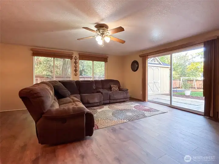 Unit A- Living Room with access to fully fenced private backyard