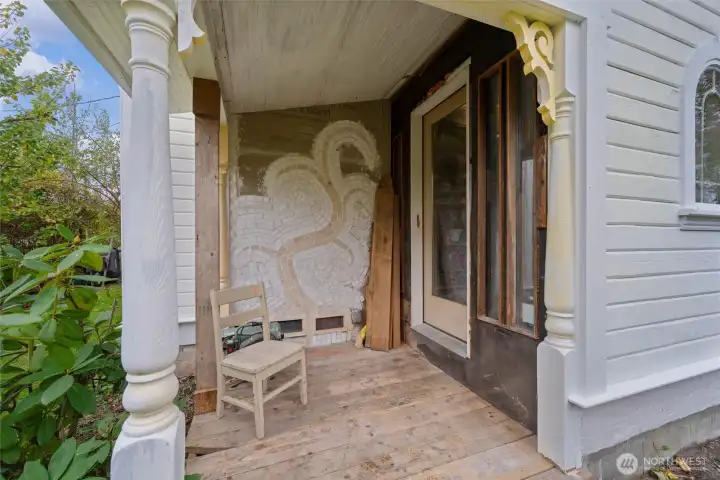 The prior owner an artist created a mosaic on the back deck.