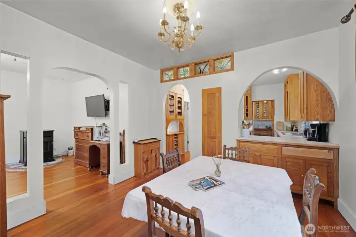 The dining room with the living room off to the left.