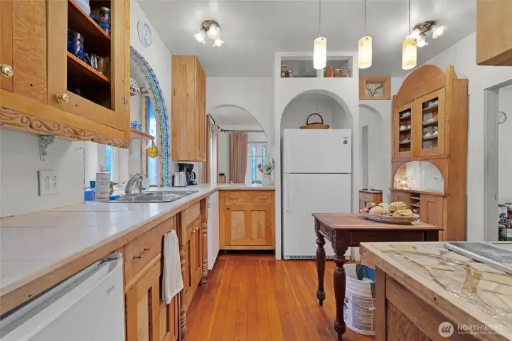 A view of the kitchen from the butler's pantry.