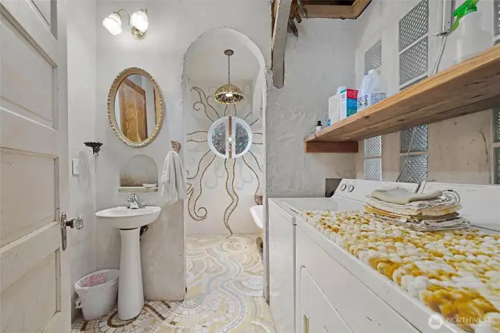 The main floor bathroom/utility room.