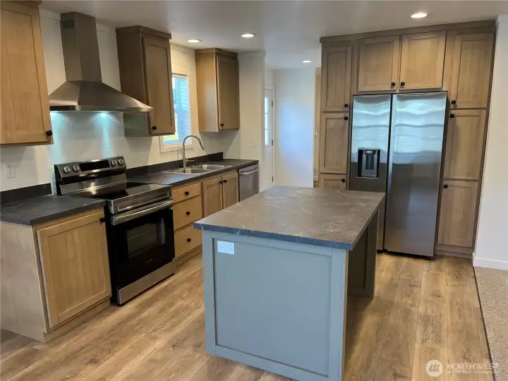 Kitchen with plenty of storage and an island too.