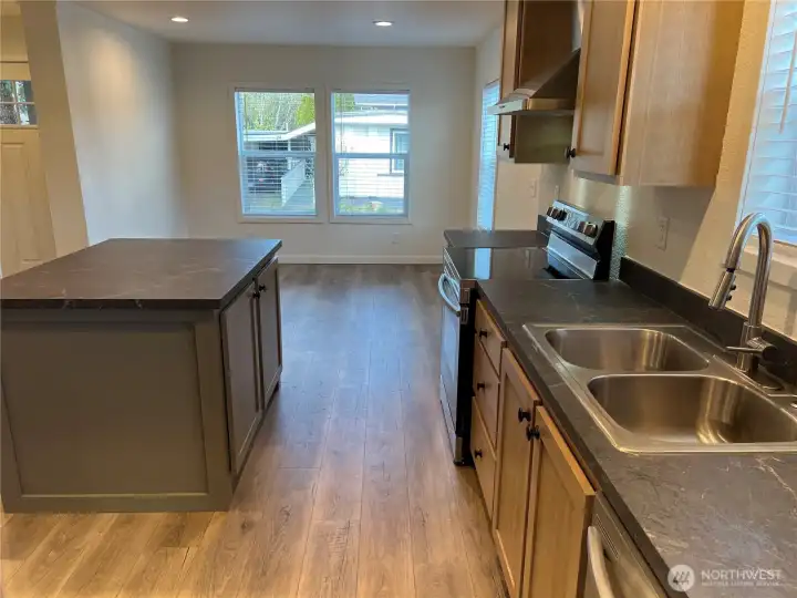 Looking into the kitchen and eating area.