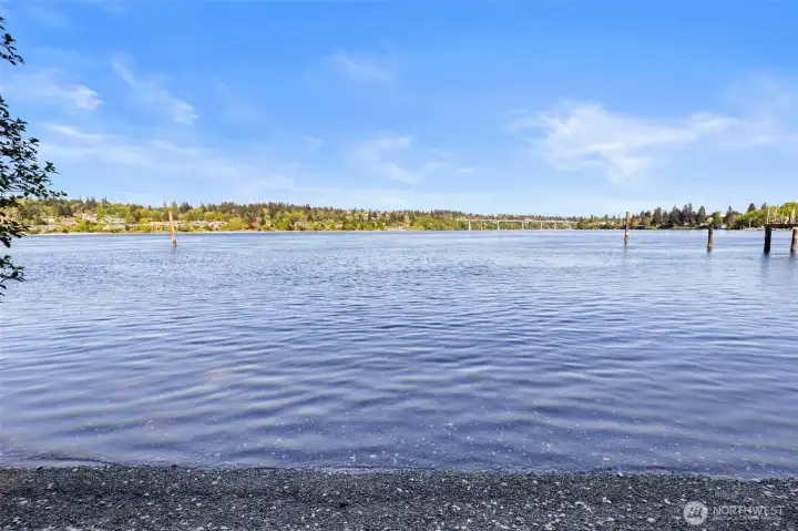 Gorgeous pebble beach overlooking the bridge and the park across the water